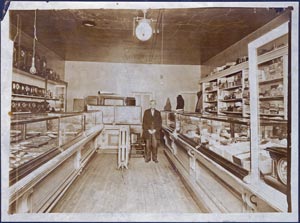 Oliver
                Miller in his store