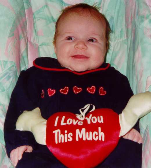 Photo of our daughter on Valentine's Day (age 6 weeks)