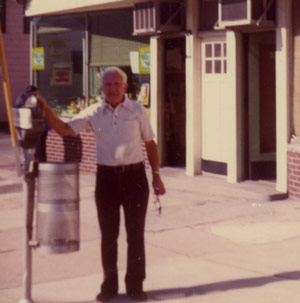 Nicky Nocchi
                in front of his store