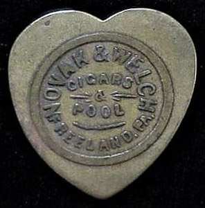 Novak & Welch pool room token