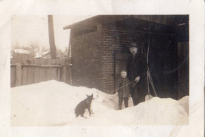 Tony and Ed near smokehouse, 1941