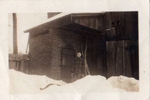 Ed and Tom near smokehouse, 1941