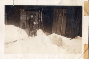 d and Tom near smokehouse, 1941